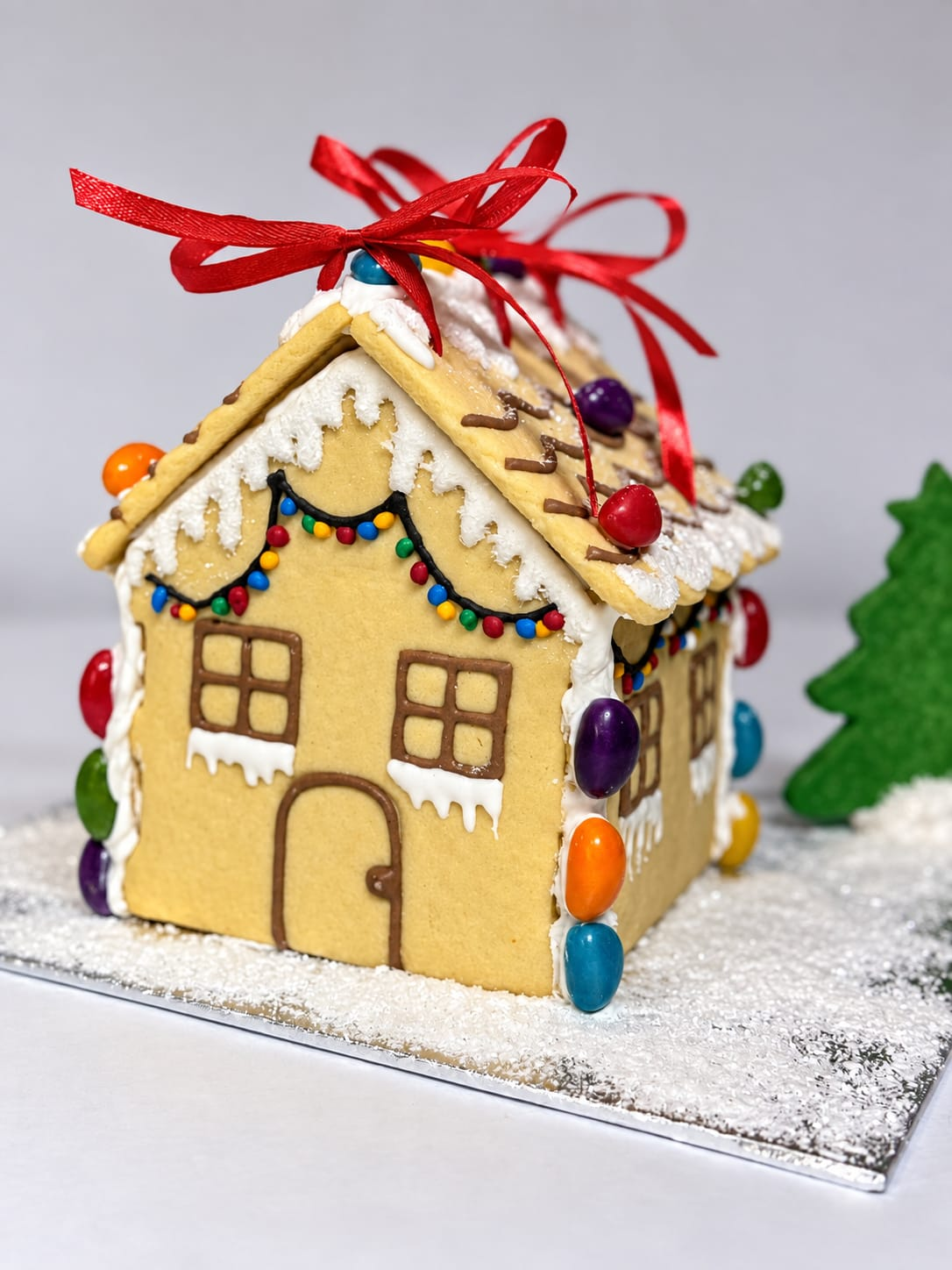 Example of a decorated classic Christmas biscuit house; kit supplied unassembled